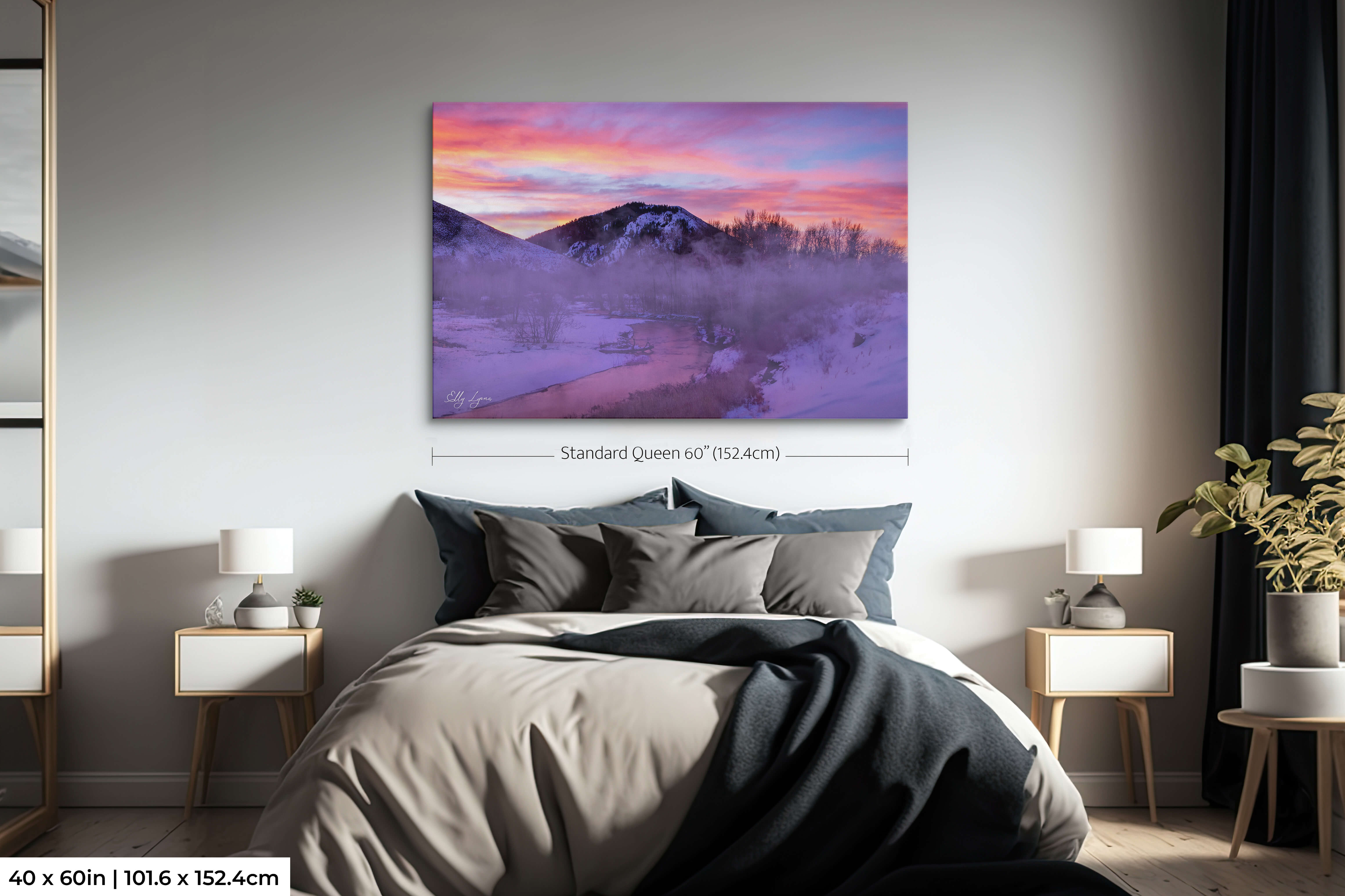 Oversized mountain sunrise with mist and snow in peaceful winter setting.