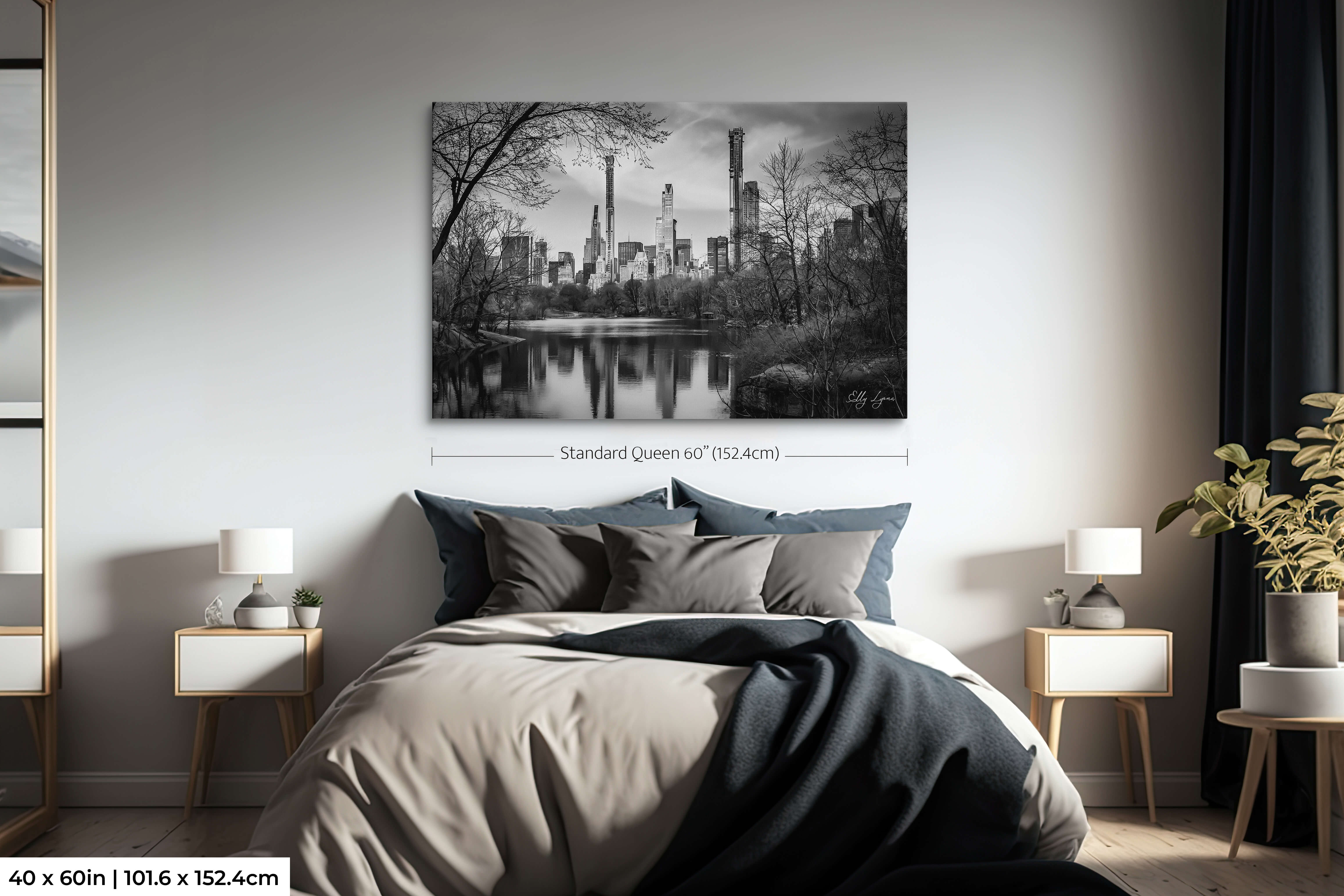 Oversized black and white NYC print placed as a dramatic headboard alternative.
