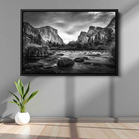 “The Stillness Between Giants” - Yosemite Valley Black and White Wall Decor | El Capitan & Cathedral Rocks River View Fine Art Print