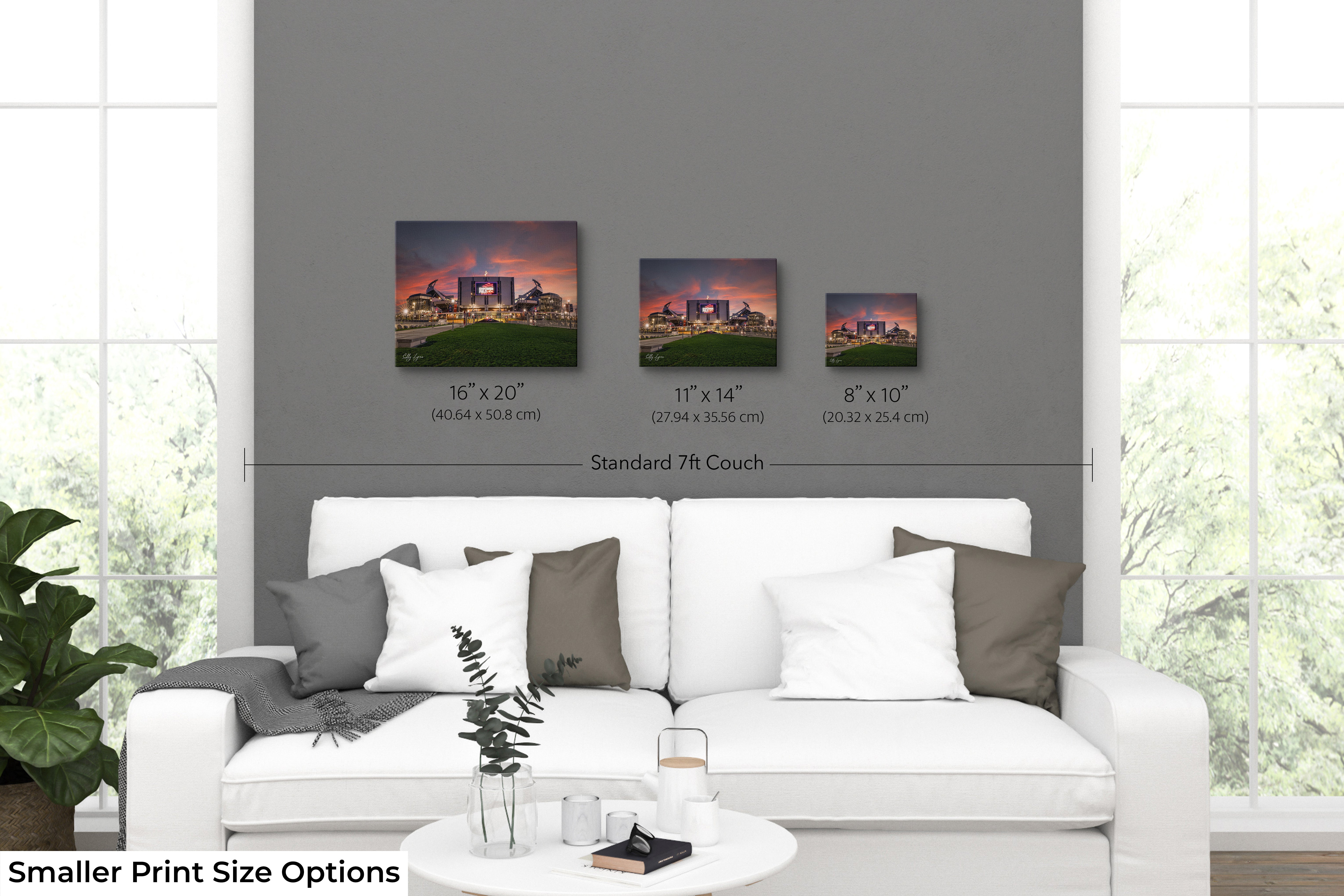 Empower Field at Mile High sunrise wall art print displayed in 3 different print sizes of 8 by 10, 11 by 14 and 16 by 20 inches, in casual living room space showcasing size comparison and scale.
