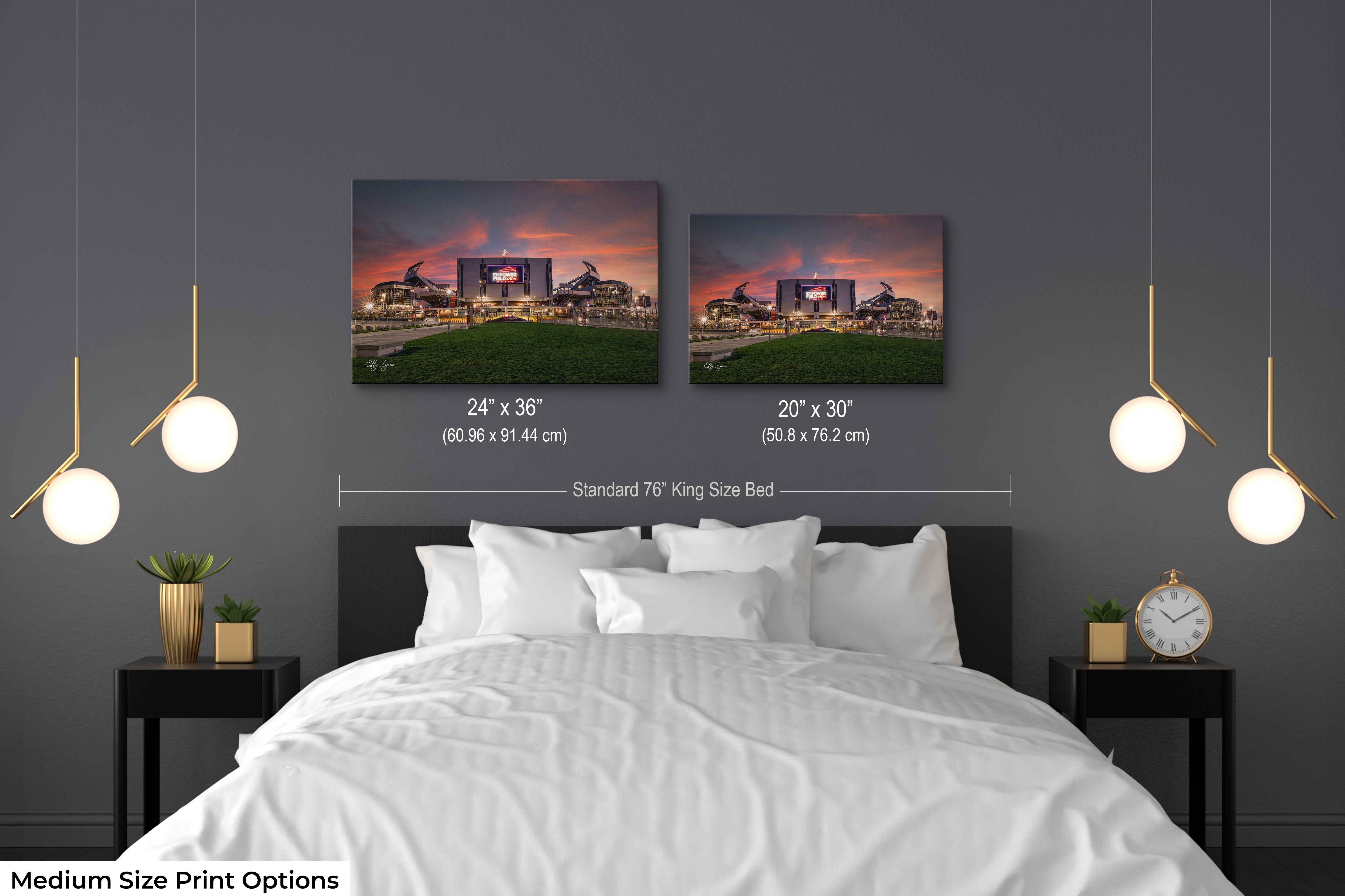 Empower Field at Mile High sunset wall art print in 2 different sizes of 20 by 30 inches and 24 by 36 inches styled over king sized bed in modern bedroom showcasing size comparison and scale.