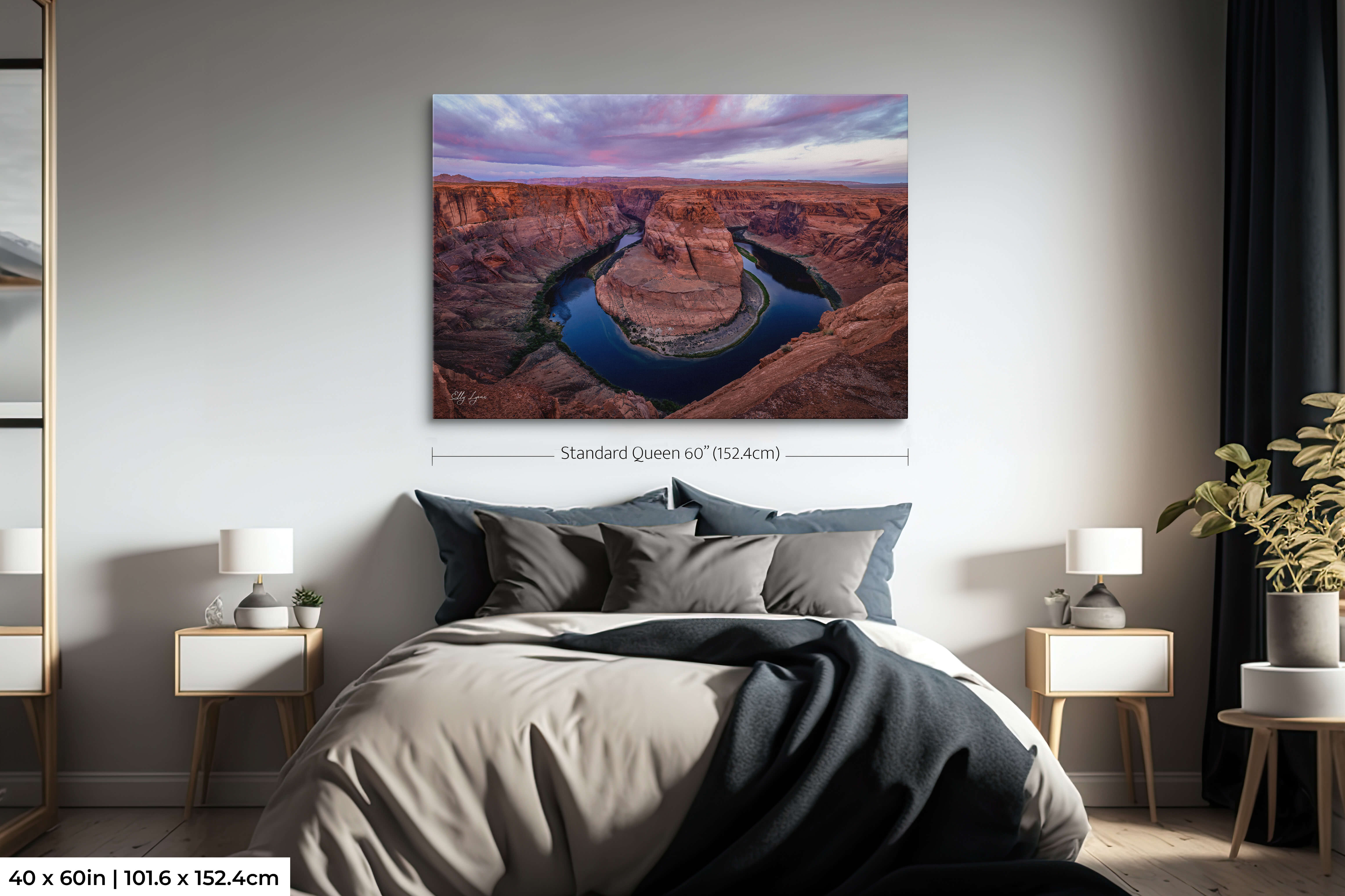 Horseshoe Bend sunrise, Colorado River wall art in 40x60 size above queen bed in cozy bedroom, showing scale.