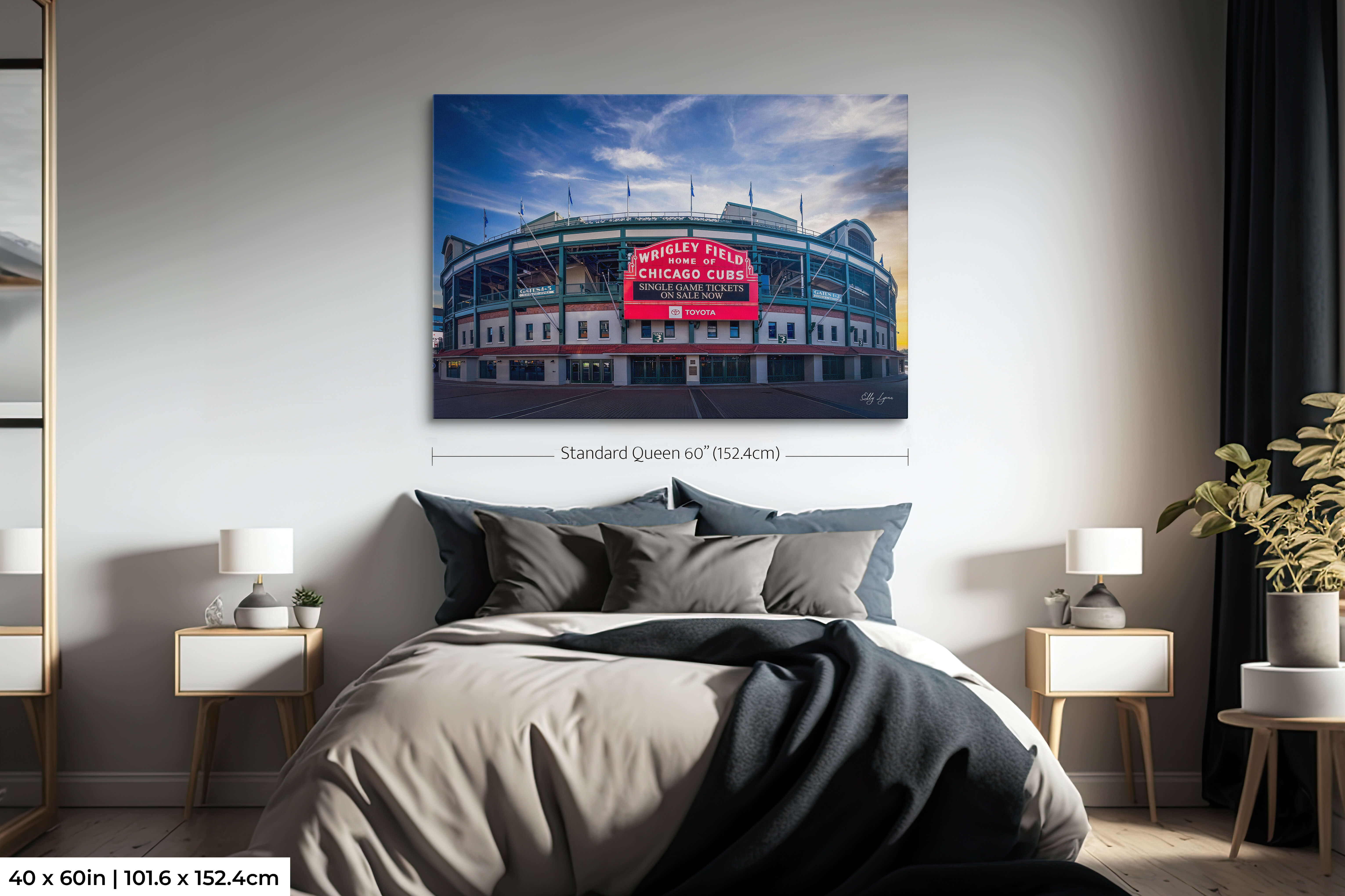 Wrigley Field sunrise wall art print extra large size of 40 by 60 inches styled over a queen sized bed in a cozy bedroom setting showcasing dramatic scale.